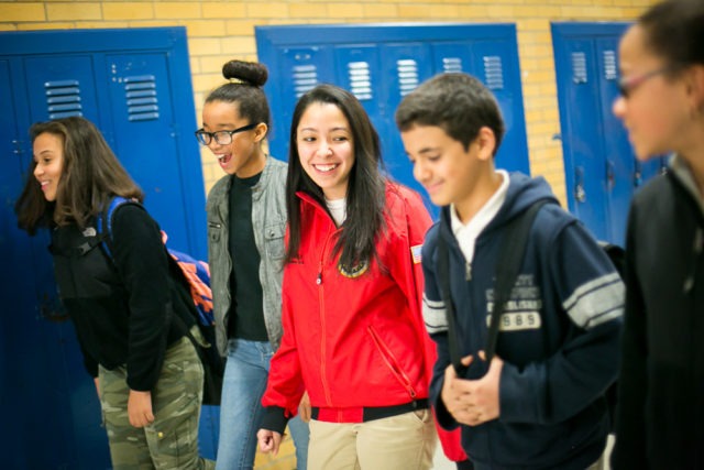 City Year AmeriCorps member in school with students