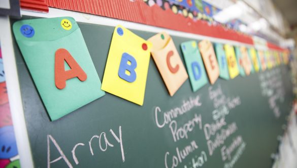 Alphabet signs displayed in the classroom.