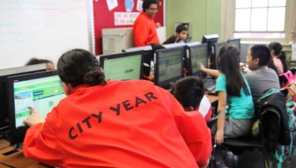 City Year AmeriCorps members facilitate Hour of Code for students